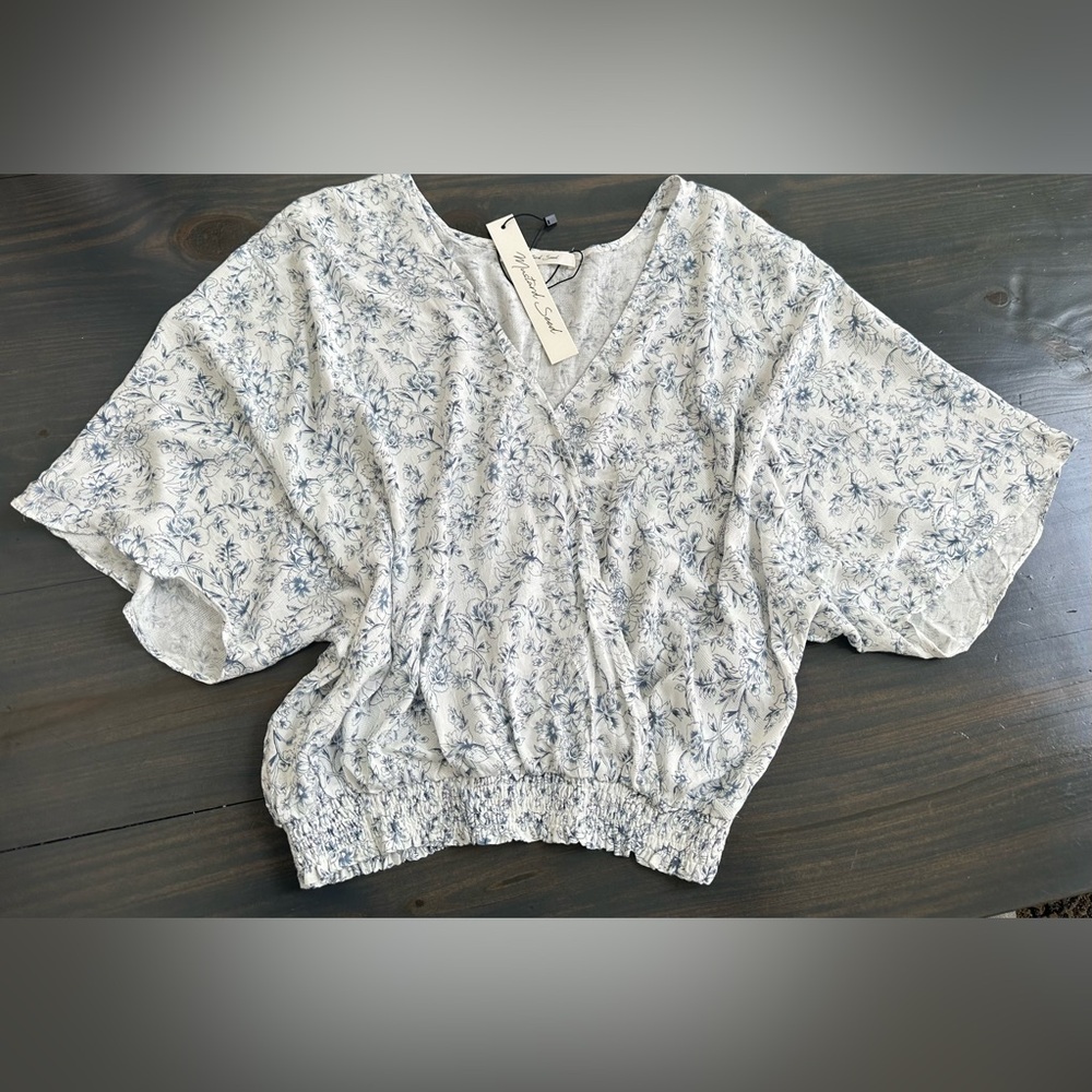 Blue and White Floral bat wing elastic waist top size M NWT